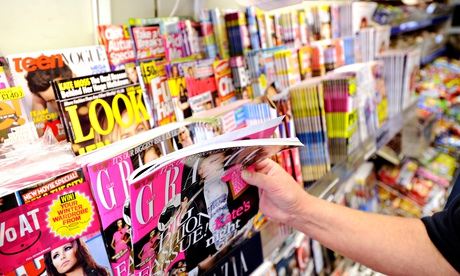 Magazines on a stand in a newsagents